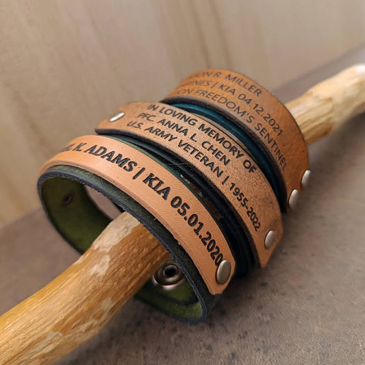 Group photo of 3 Military memorial leather bracelets in khaki, airforce blue and black.