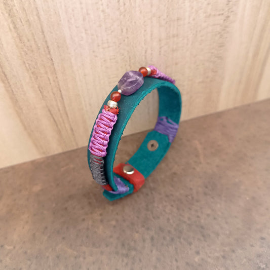 Side view showing braided macramé cord and petrol blue leather of the Amethyst Bracelet