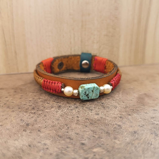 Full front view of the Ancestral Earth Bracelet showing African Turquoise centerpiece and braided top