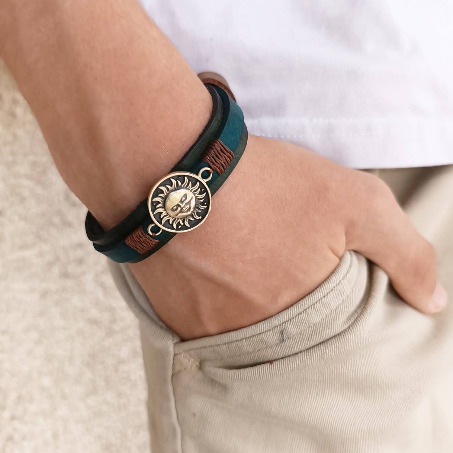 Apollo's Radiance Bracelet worn on wrist, showing its bold yet gentle style and comfortable fit. Handmade by Lucky Seven Leather.