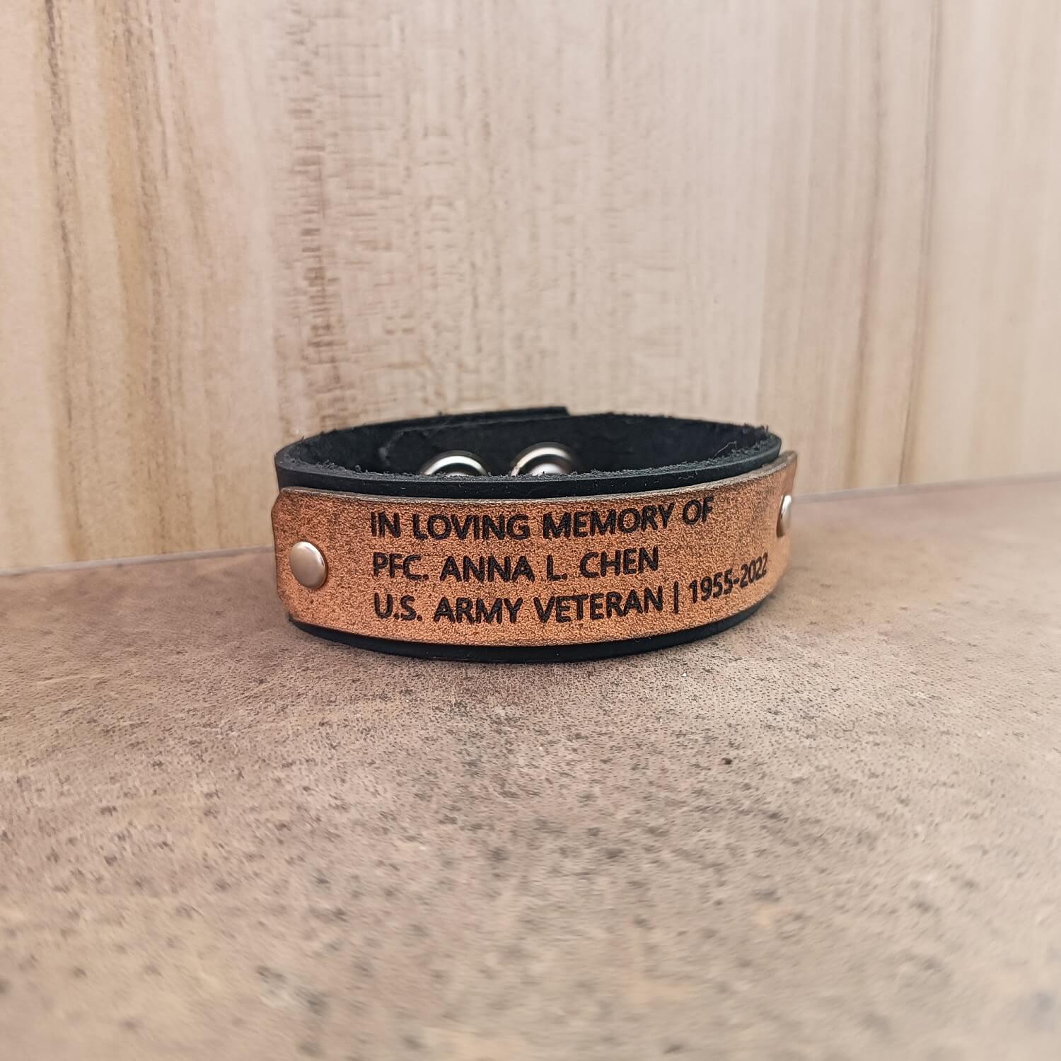 Engraved Leather Cuff Tribute with Name and Dates in black