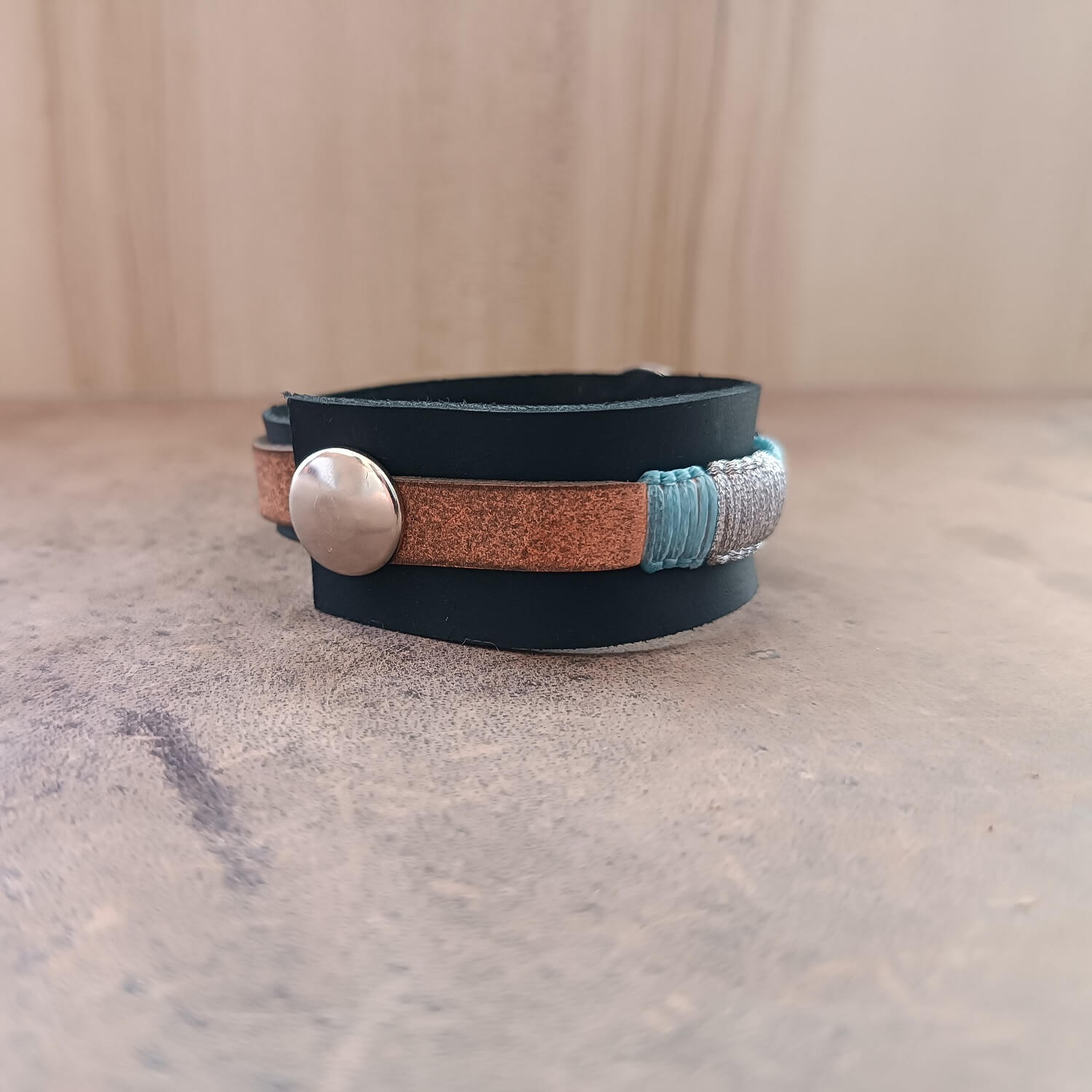 Stainless Steel Snap Button Closure on Black Leather Cuff Bracelet