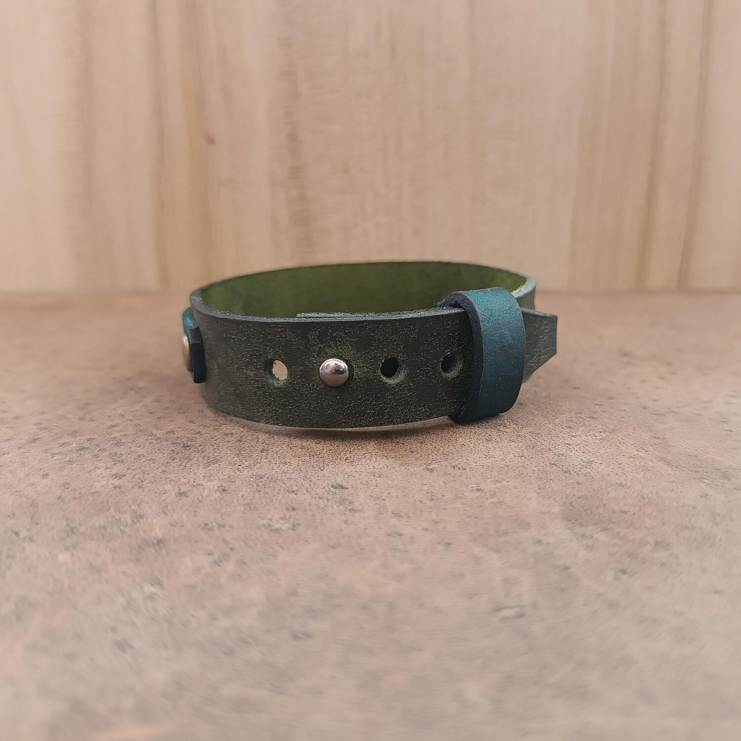 Adjustable closure and optional engraved message on the underside