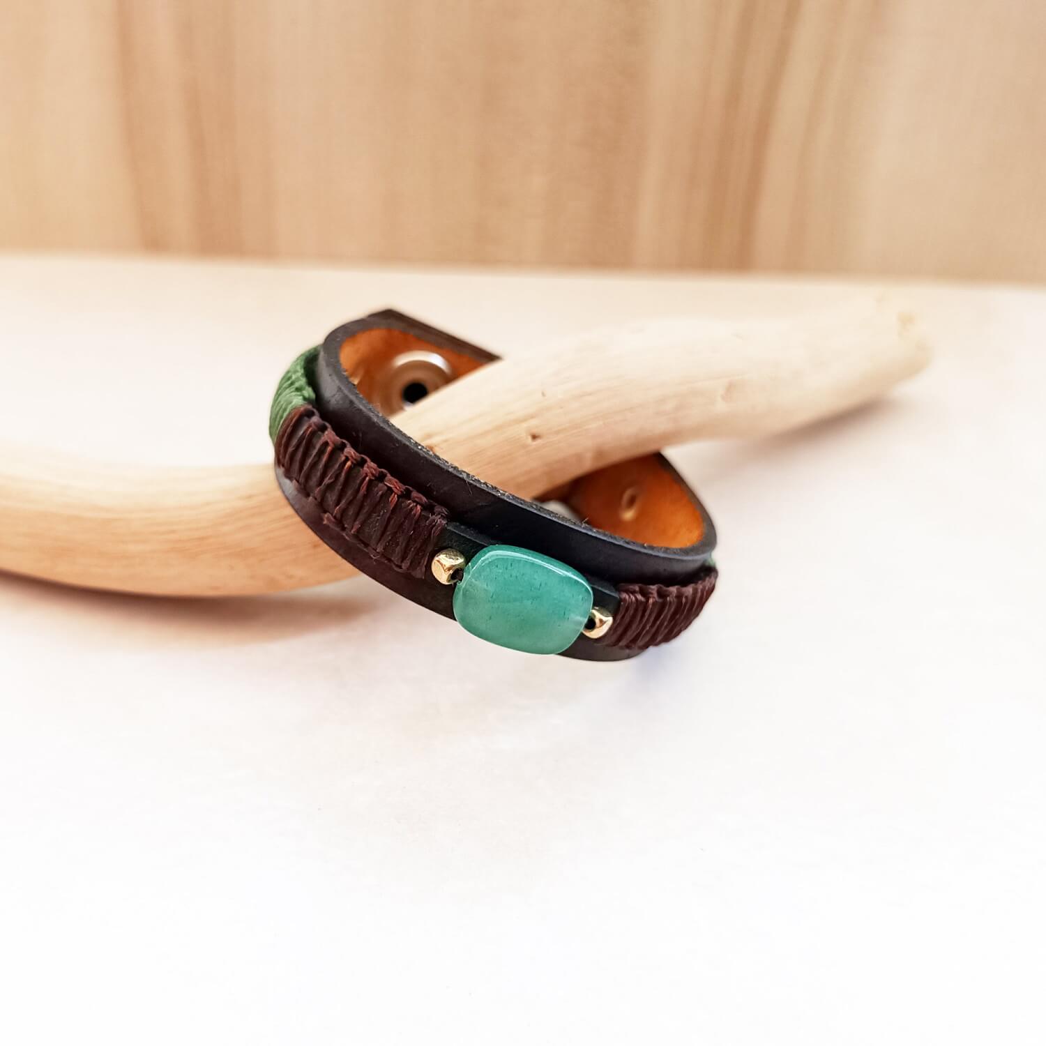 Side angle showing dual-layer leather and cord wraps