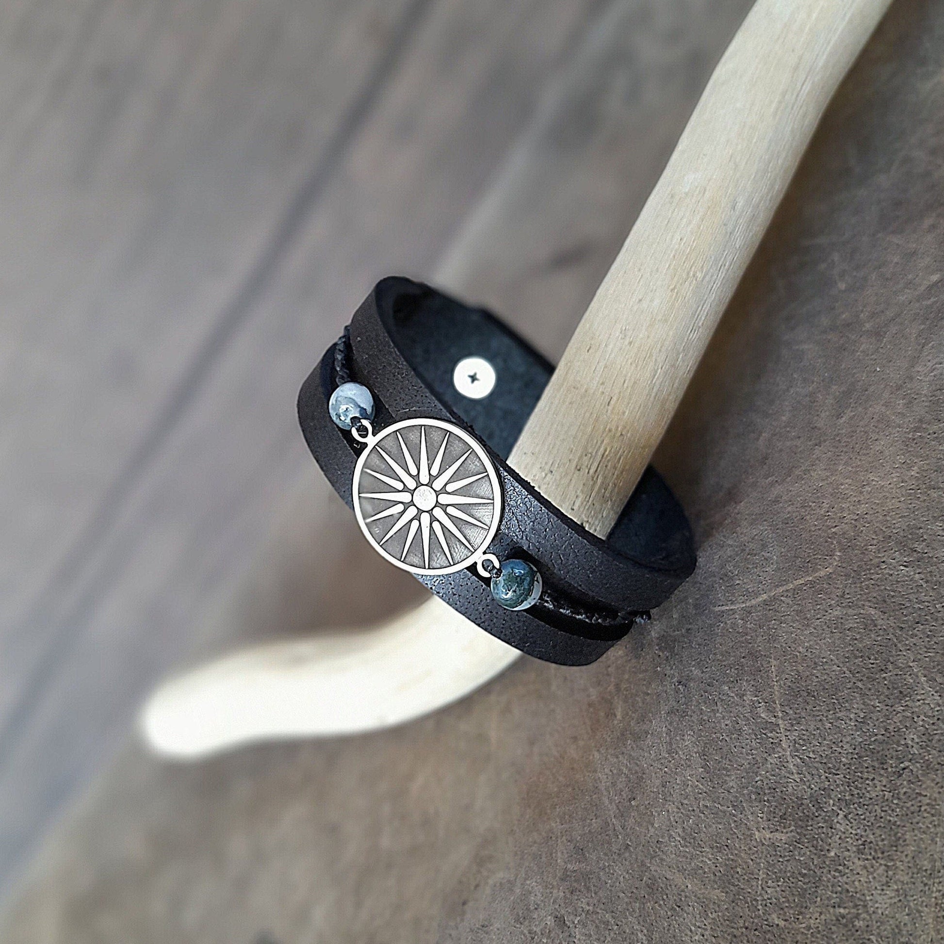 Close-up front view of Silver Vergina Sun Black Leather Bracelet, focusing on the detailed German Silver Vergina Sun charm.