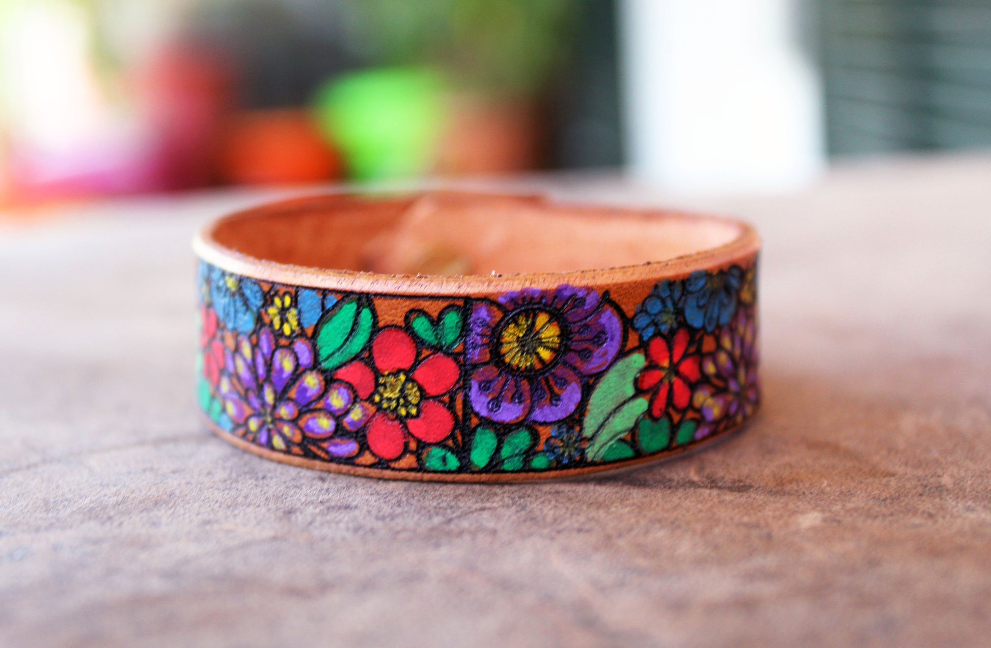 Close-up of Hand-Painted Flowers Bracelet, highlighting the unique hand-painted strokes and vibrant color blending, reflecting stained glass inspiration.