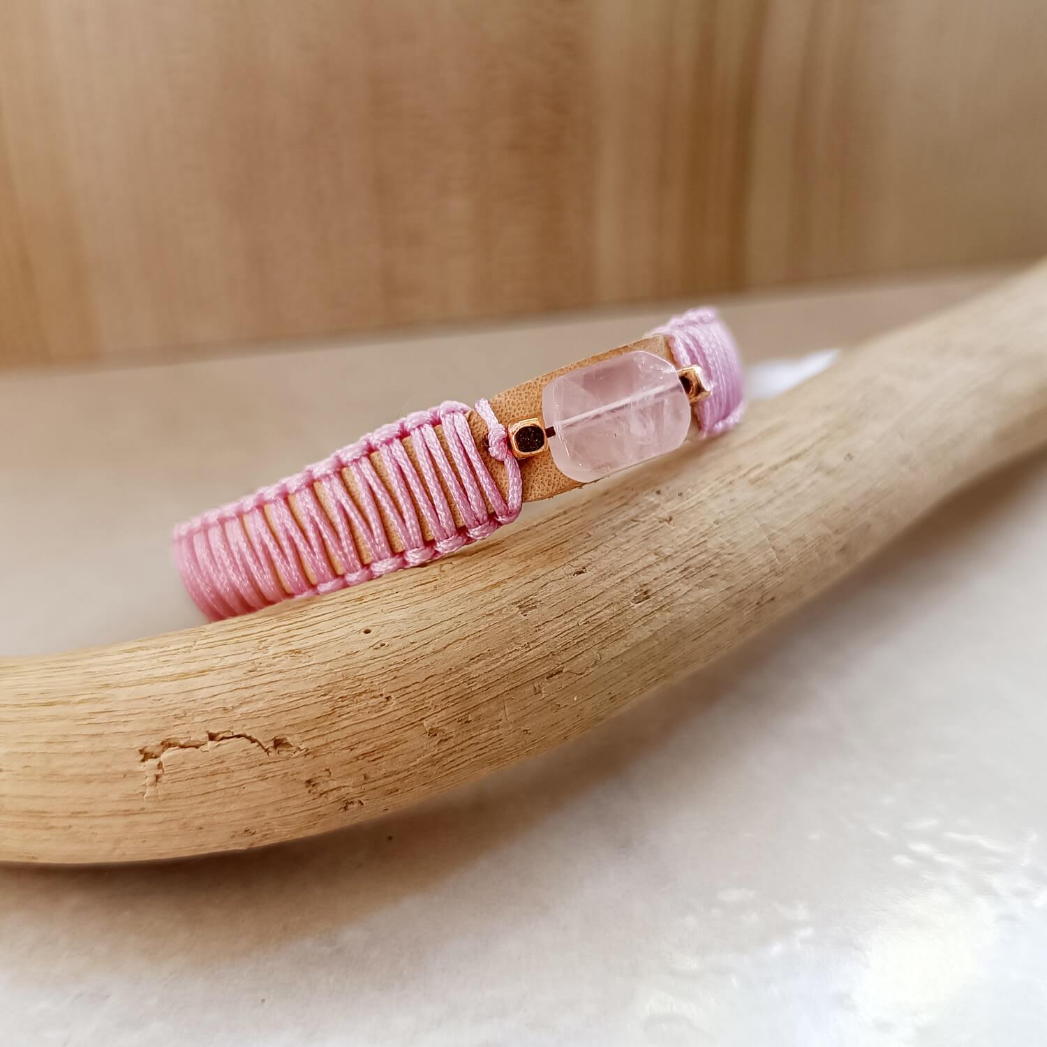 close up of the rose quartz and pink macrame knotting