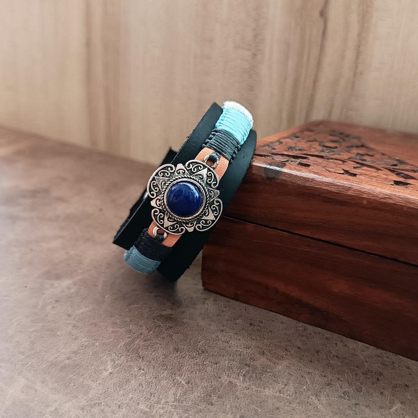 Close-up of Natural Lapis Lazuli Stone in Silver Star Pendant and Macrame Knotting