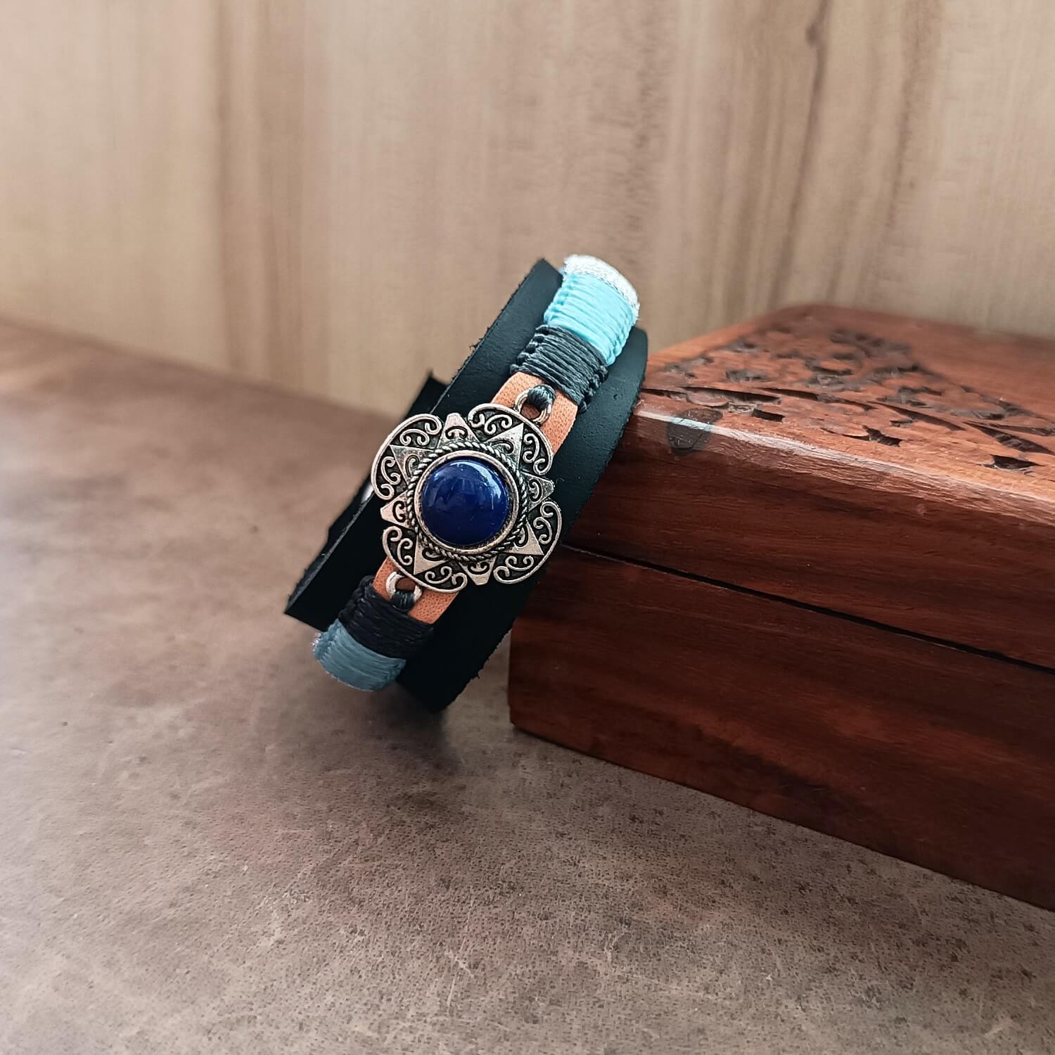 Close-up of Natural Lapis Lazuli Stone in Silver Star Pendant and Macrame Knotting