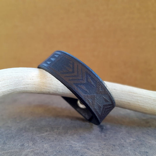 Close up side view of the thick Polynesian Tribal leather bracelet
