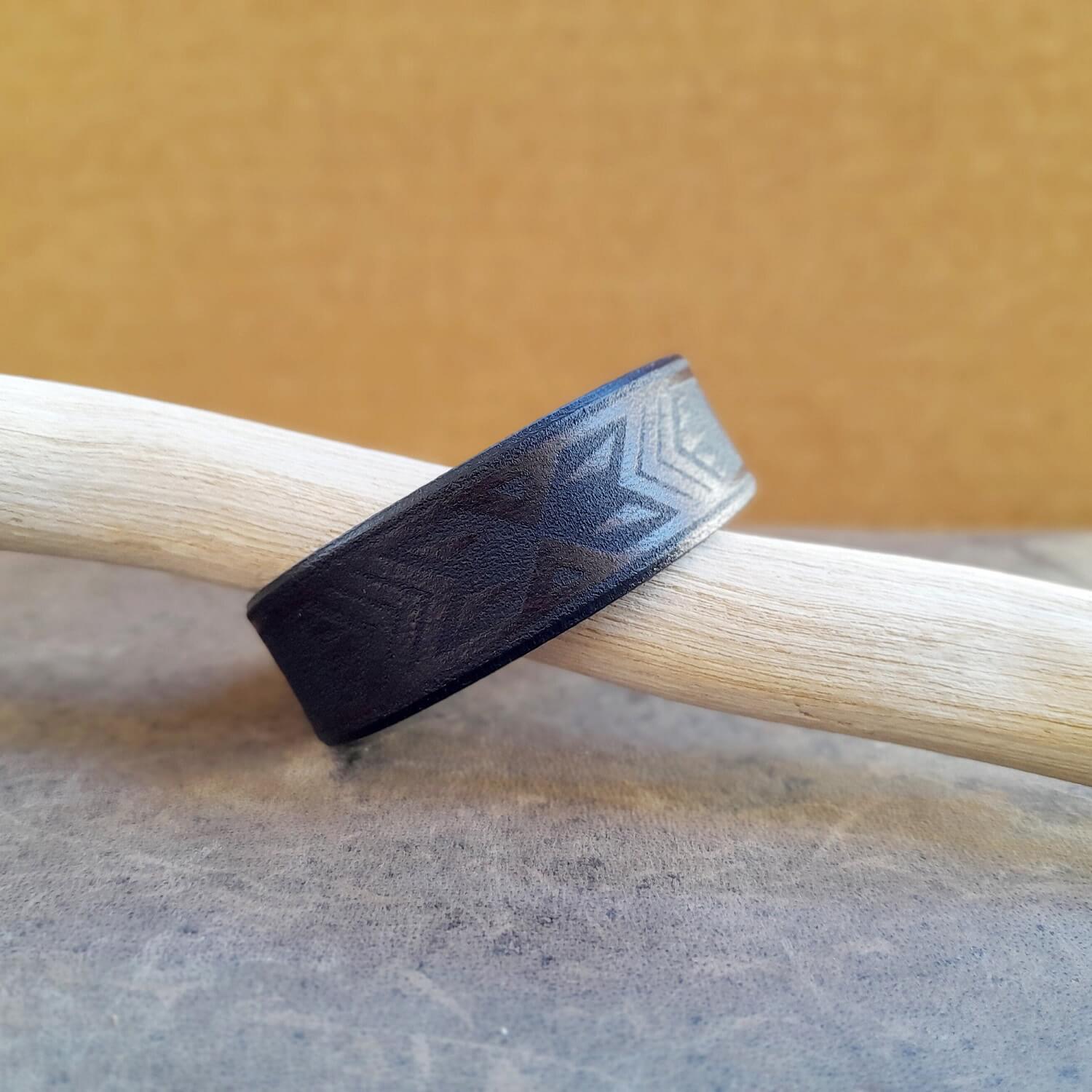 Close up view of the thick Polynesian Tribal leather bracelet, showing leather texture