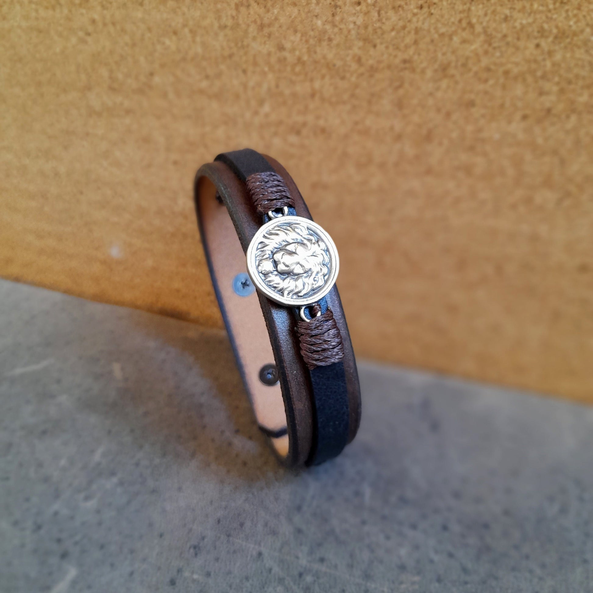 Full view of Lion Leather Bracelet, featuring its rich two-tone leather design and symbolic lion meaning.