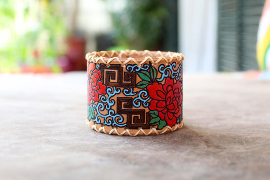 Extra wide leather cuff with hand painted Japanese floral abstract design on sunlight