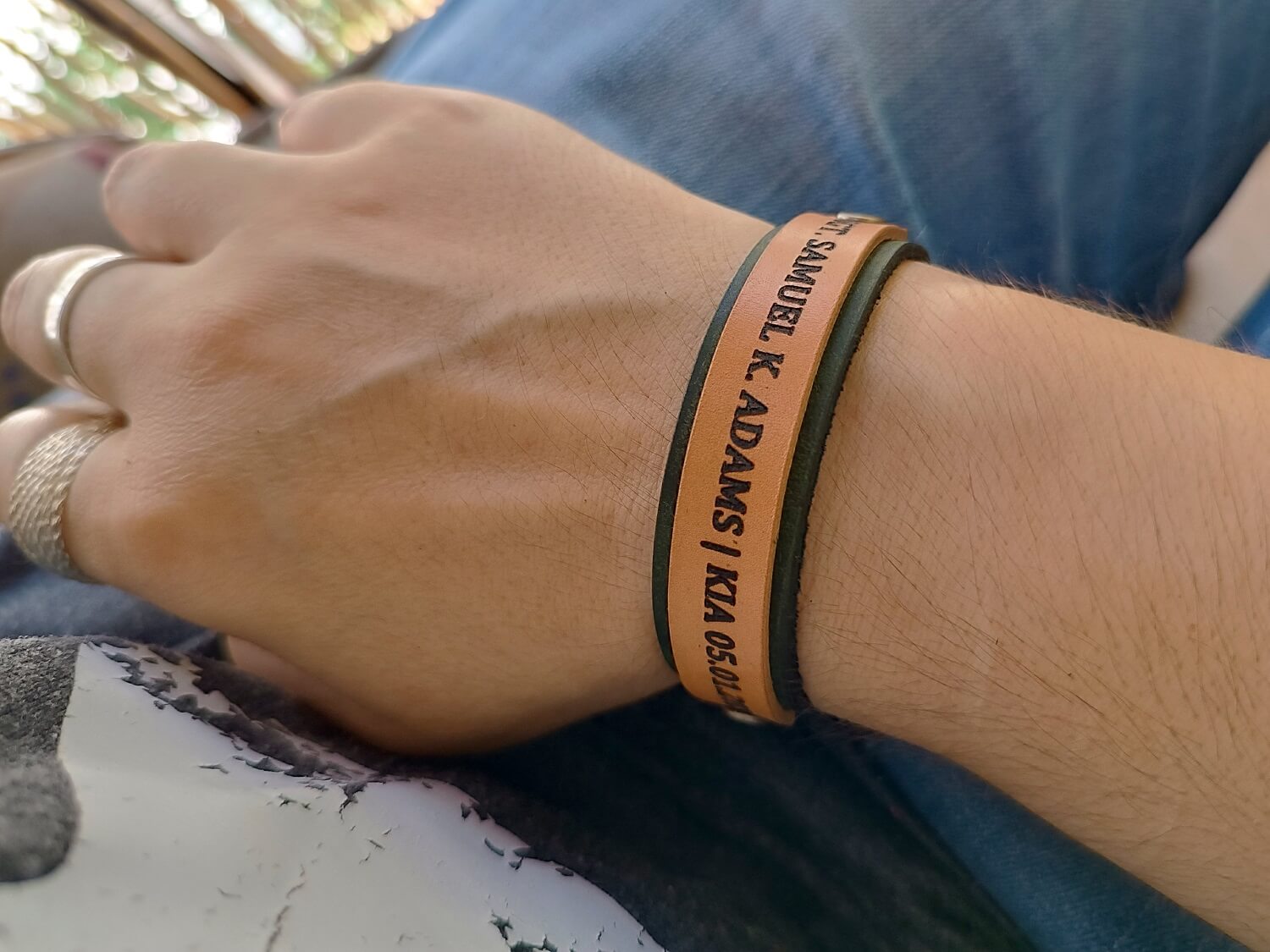 Khaki Leather Memorial Bracelet for Fallen Soldier, worn on a woman's wrist