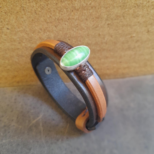Natural Nephrite Jade leather bracelet with a green jade stone, on layered chestnut and honey brown leather.