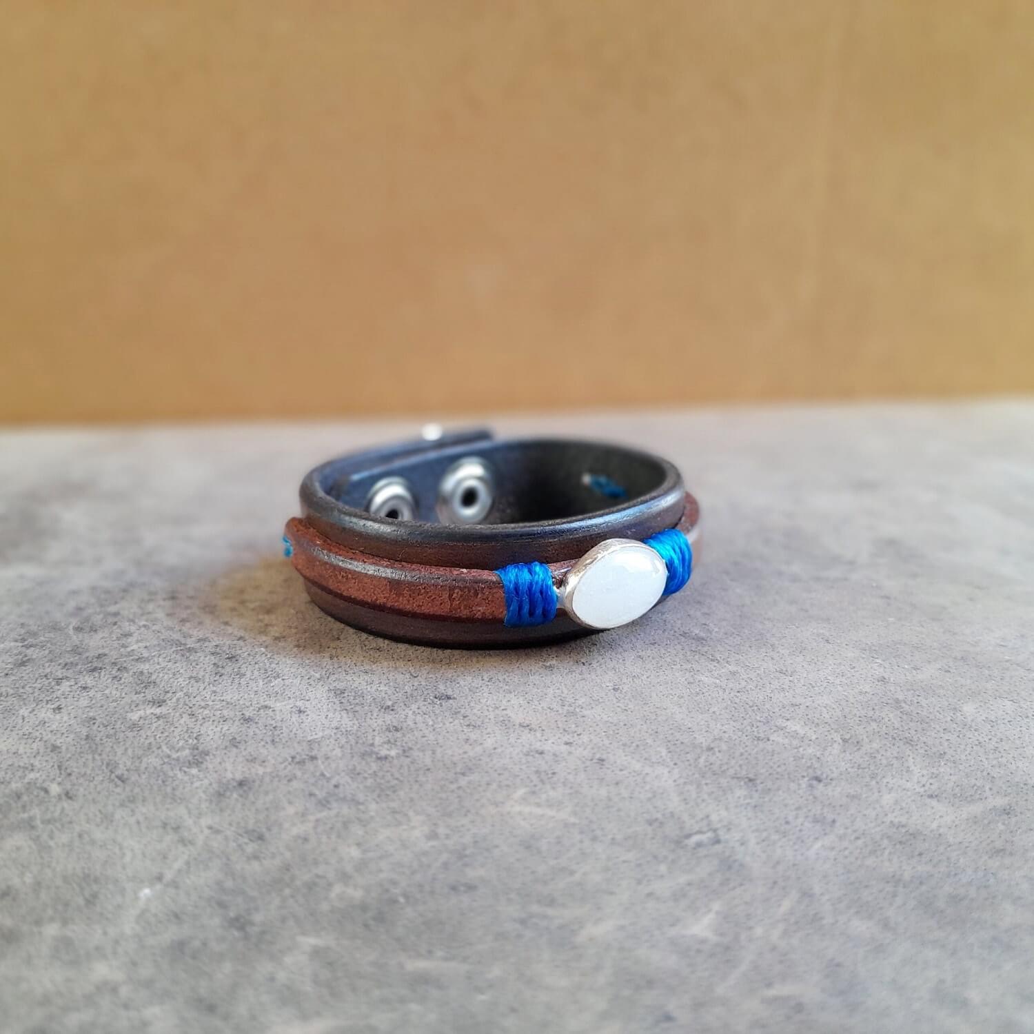 Natural Opal Leather Bracelet on Sterling Silver Pendant, showcasing the oval opal and chestnut brown leather.