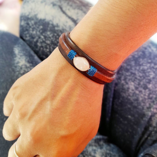 Natural Opal Leather Bracelet worn on a woman's wrist, showing how it drapes and the opal's shimmer.