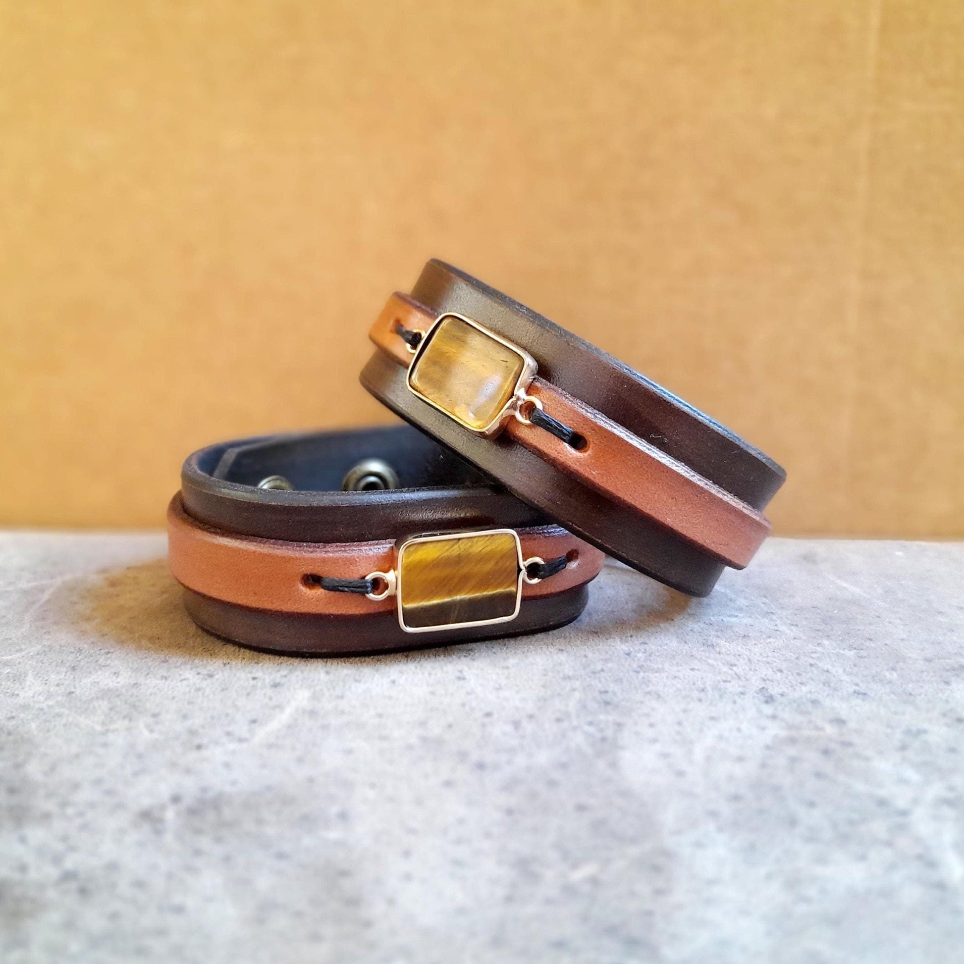 Natural Tiger's Eye leather cuff bracelet in a layered design with a dark brown full-grain leather base.