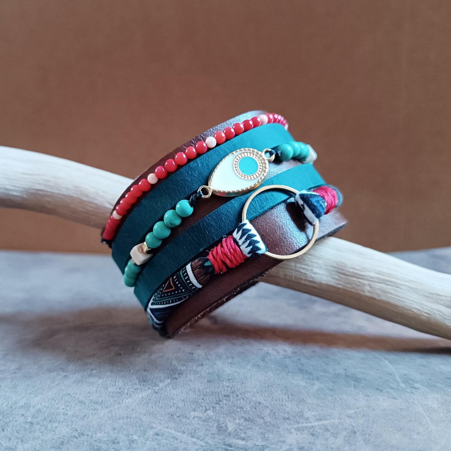 Close-up side view showing the hammered rivets and double hand-stitching with beeswax thread on The Warrior Stack cuff, emphasizing its durability and craftsmanship.