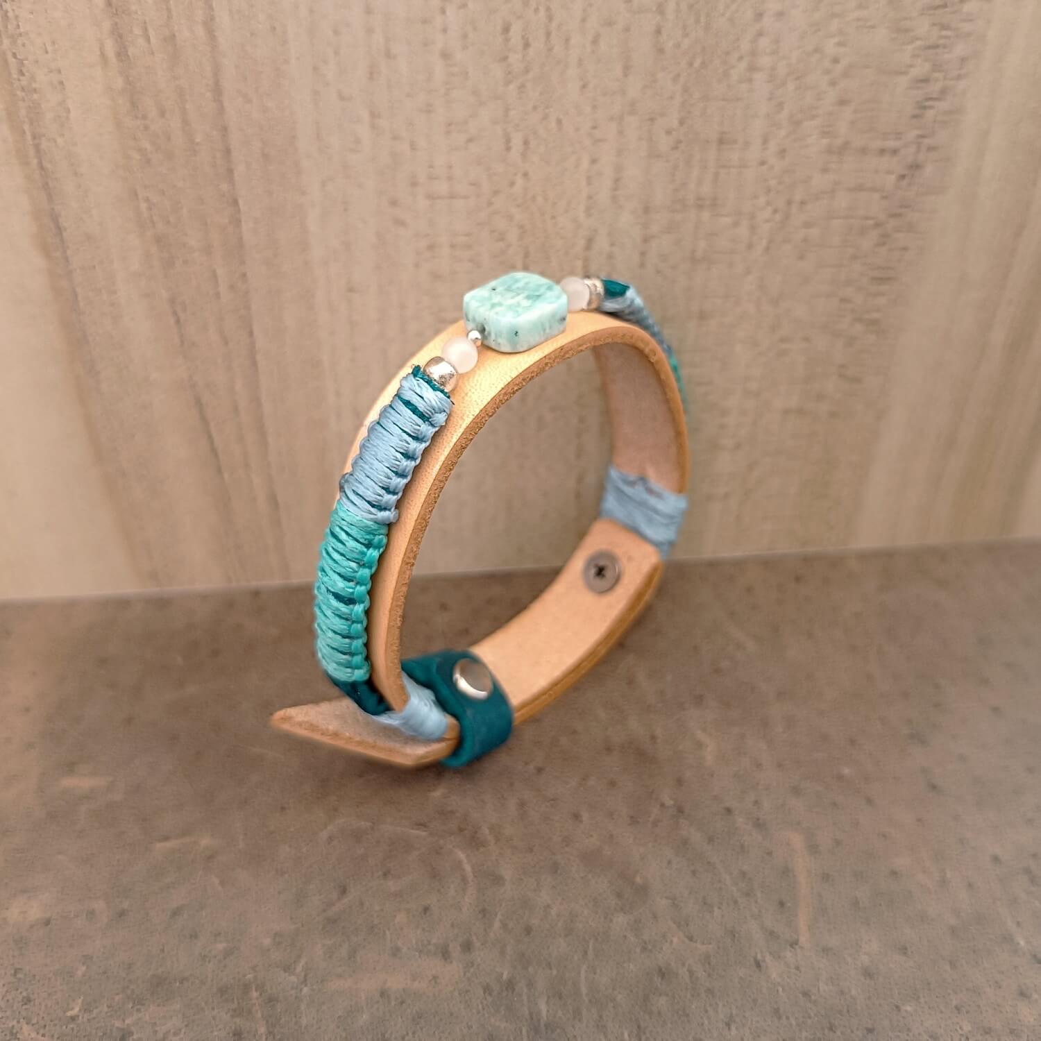 Close up side view of the Amazonite leather bracelet showcasing the braided cord