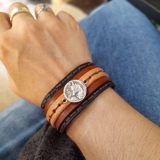 silver fox layered leather cuff worn on a woman's wrist