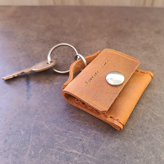 Warm Brown leather keychain ringholder pouch with engraved text "Forever Young"