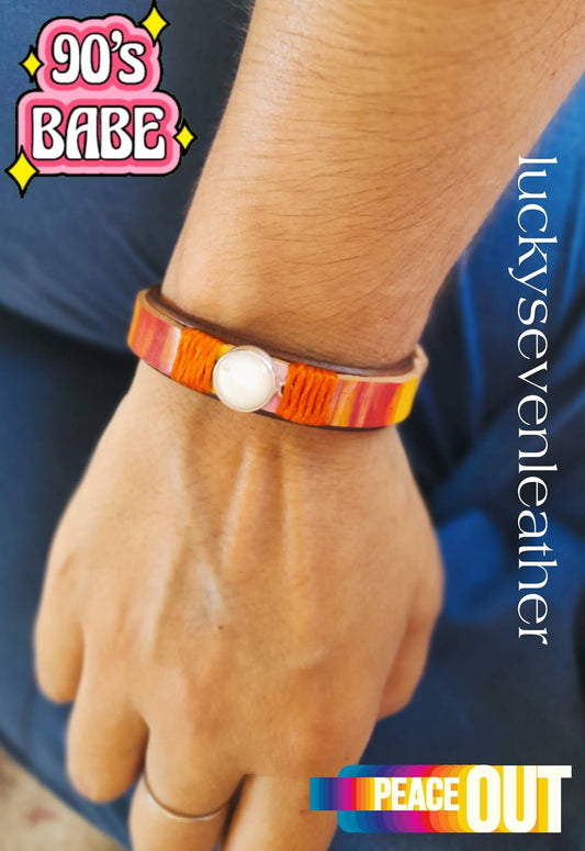 The 90's Pop Moonstone Bracelet worn on a wrist, demonstrating its comfortable fit for any size and its bright, fun aesthetic.