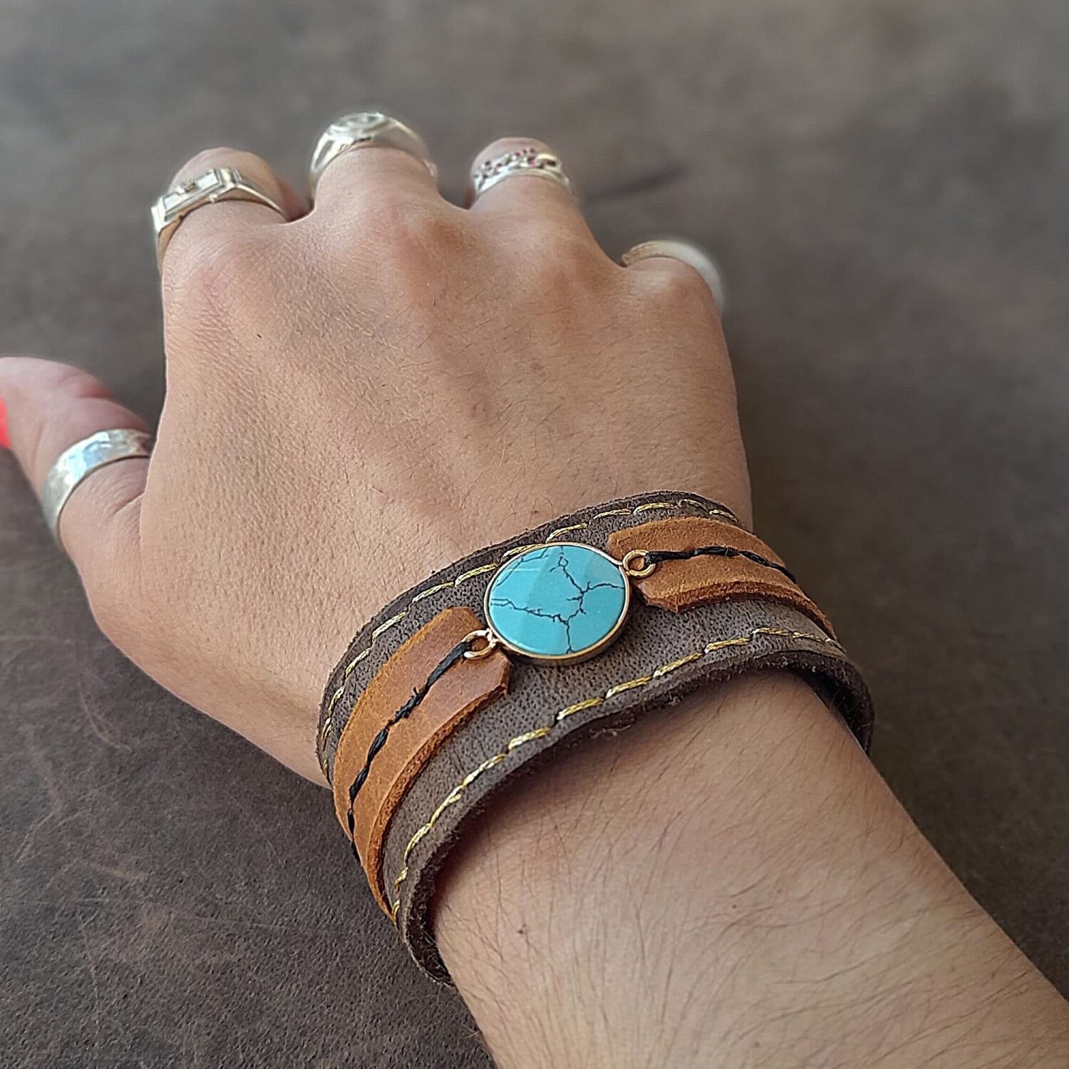 The Boho Turquoise Cuff worn on a M size wrist, demonstrating its comfortable fit, wide design, and romantic boho aesthetic.