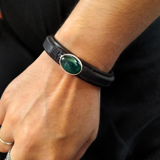 The Dark Green Aventurine Leather Bracelet worn on a wrist, demonstrating its comfortable fit, layered design, and versatile appeal.