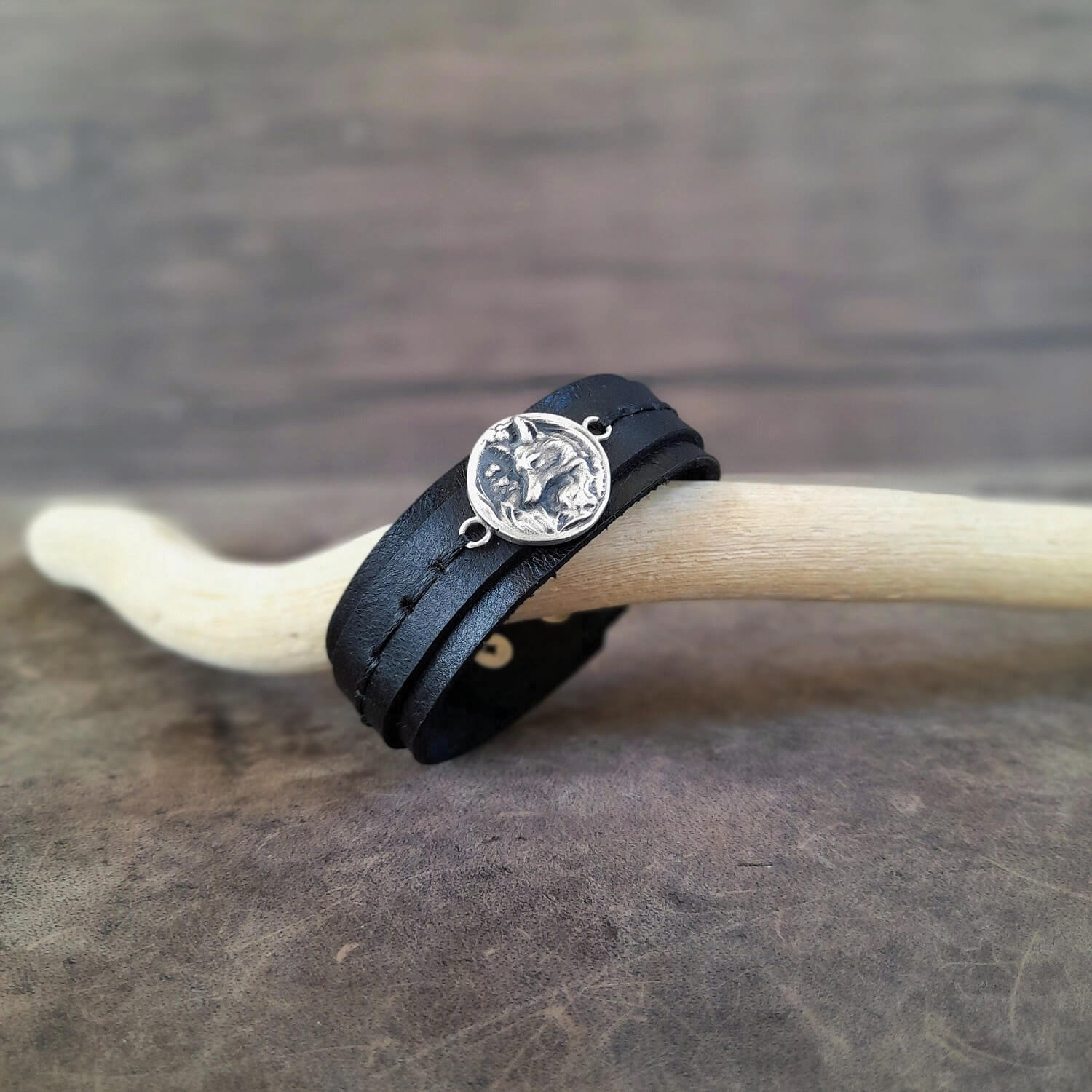 The Forest Fox Leather Bracelet: A layered black full-grain leather cuff featuring a detailed handmade Silver 925 Forest Fox Charm.