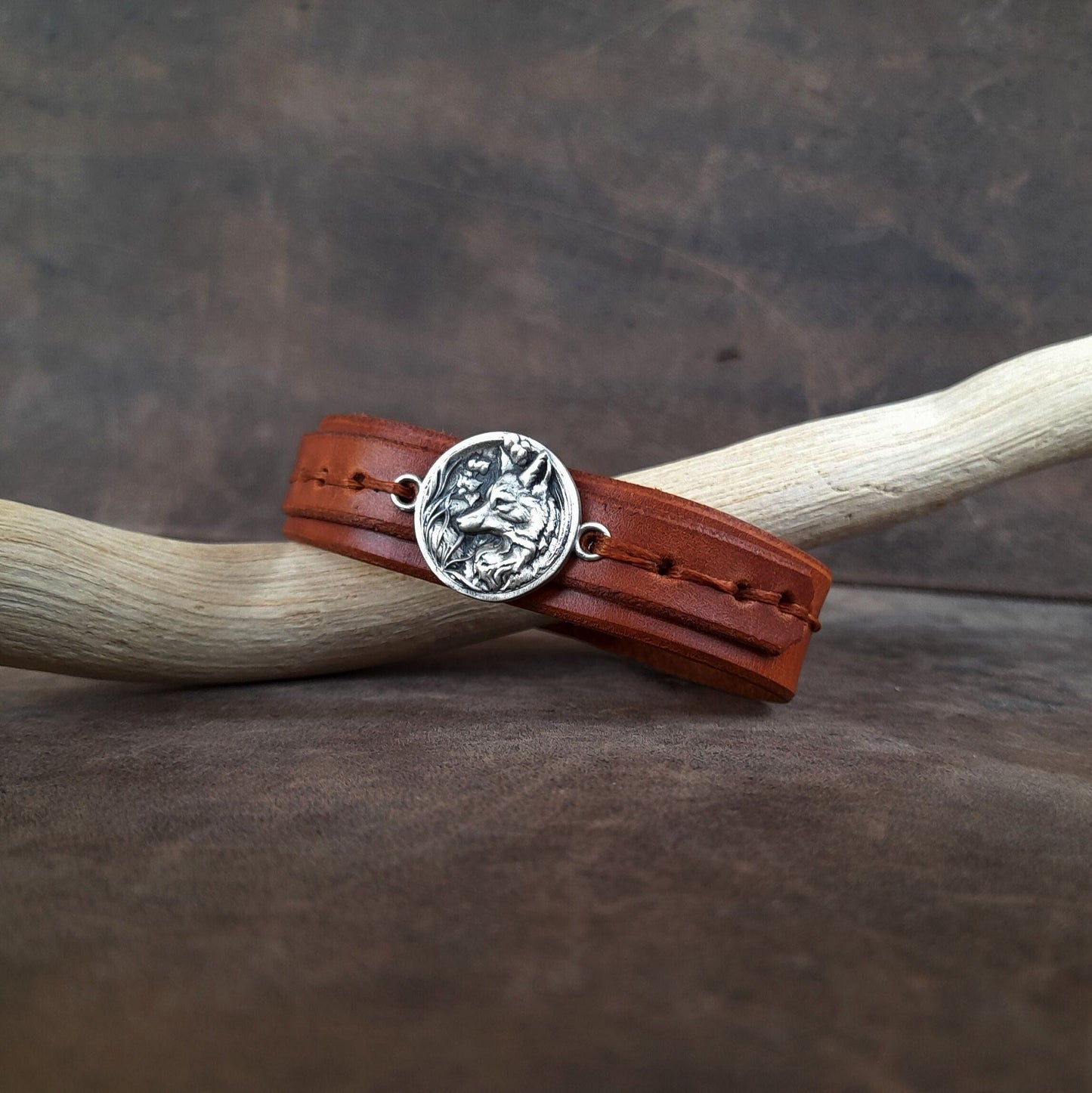 The Forest Fox Leather Bracelet: A layered brown full-grain leather cuff featuring a detailed handmade Silver 925 Forest Fox Charm.