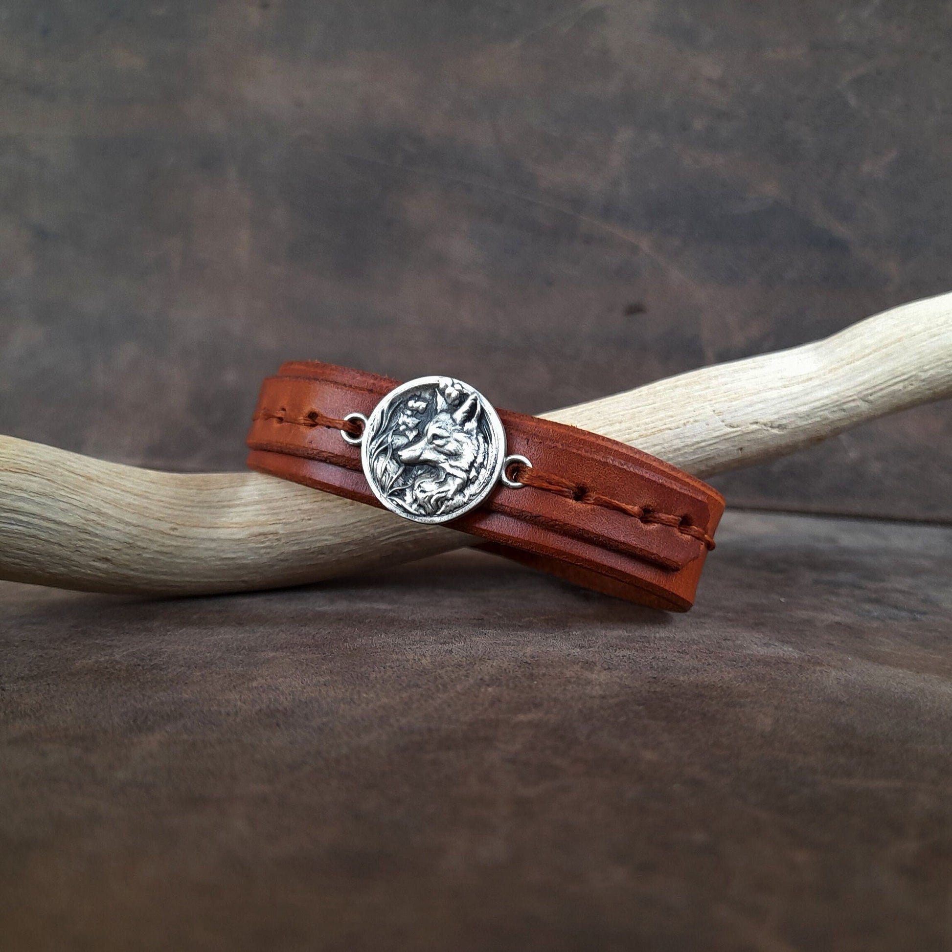 The Forest Fox Leather Bracelet: A layered brown full-grain leather cuff featuring a detailed handmade Silver 925 Forest Fox Charm.