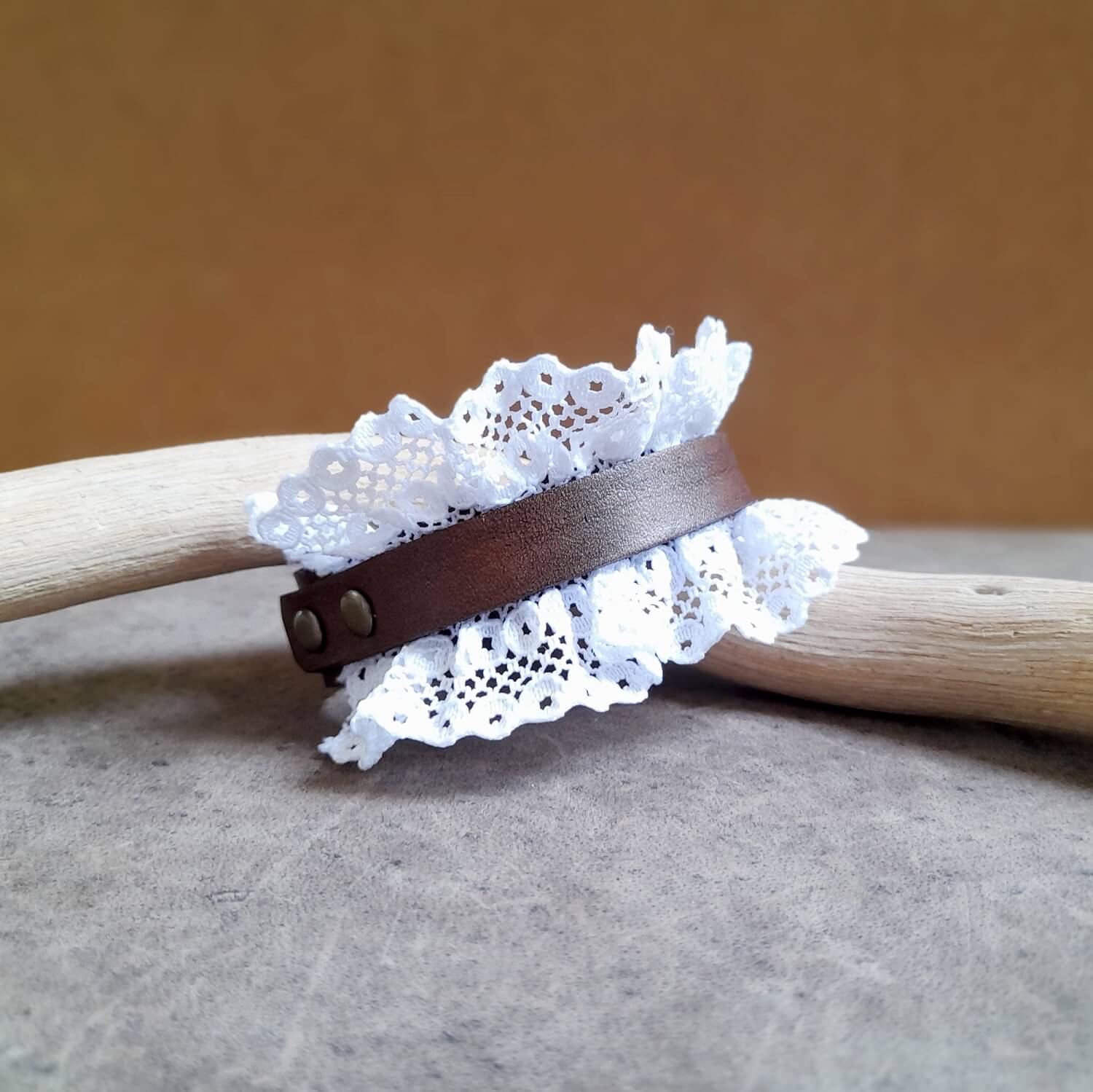 Layered Leather & Edge Detail:
Close-up showing the layered dark brown Crazy Horse leather bands (1cm top, 2cm bottom) on The Prairie Lace Cuff, emphasizing texture and craftsmanship.