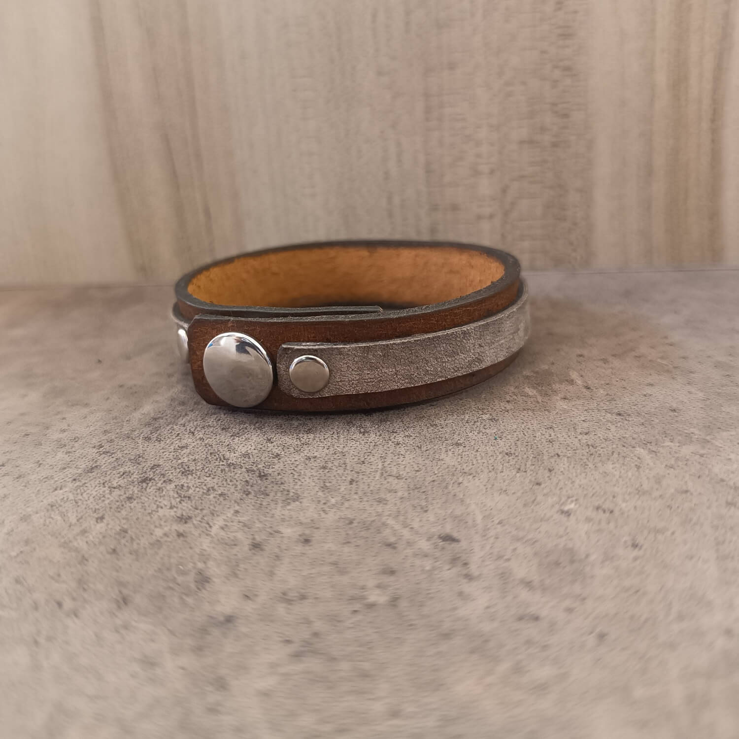 Back View of the stainless steel snap button closure on The Silent Witness Bracelet, demonstrating its practical and secure adjustable fit.