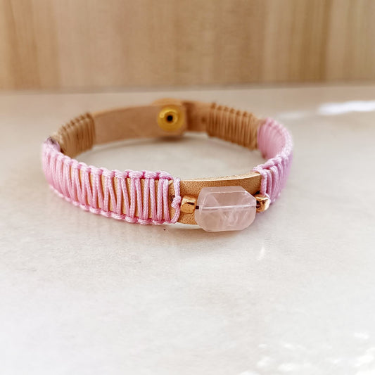 Unconditional Bloom Rose Quartz & Crazy Horse leather bracelet. Handcrafted dusty rose macrame & rose gold closure.