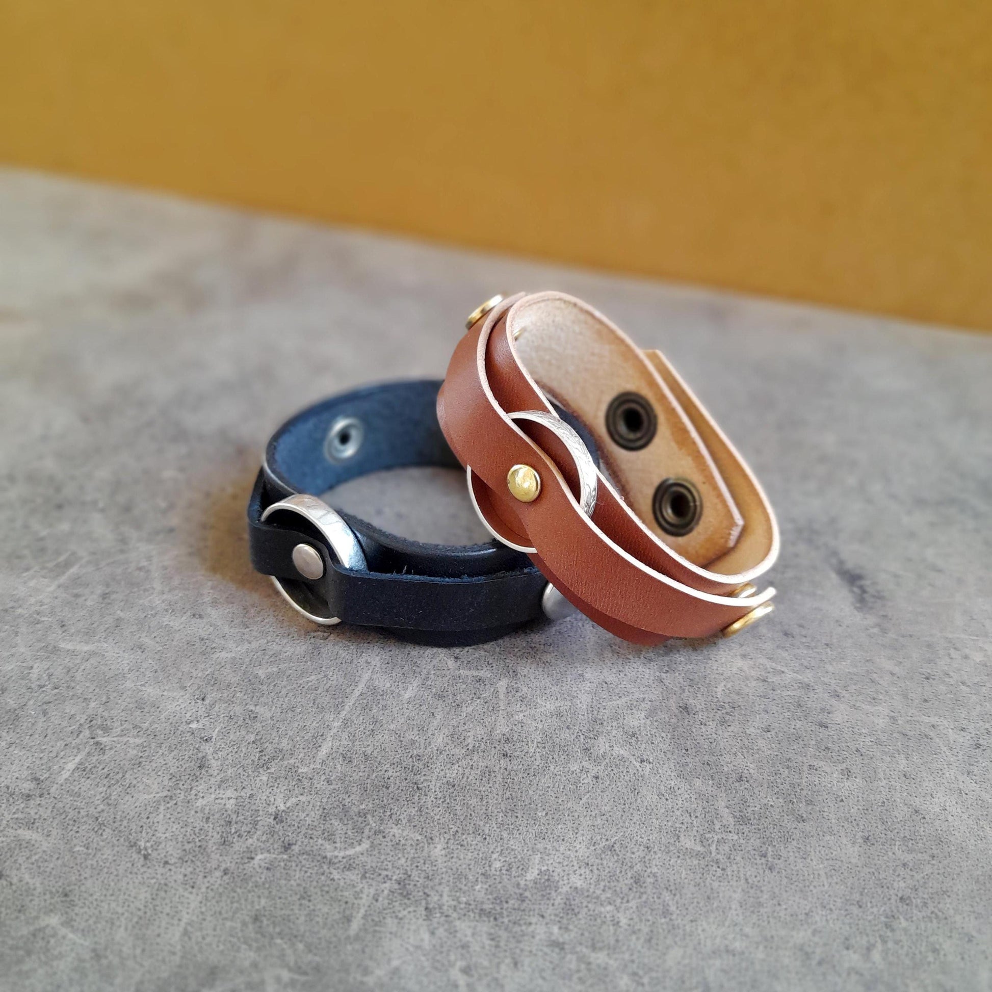 Vachetta Leather Ring Holder Bracelets in brown and black - sideways view