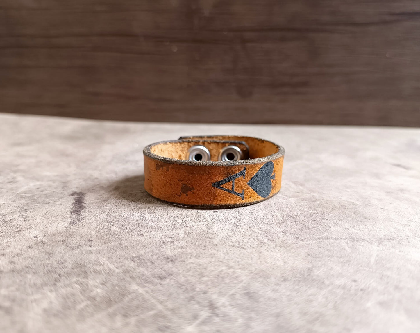 brown lather cuff bracelet with ace of spades