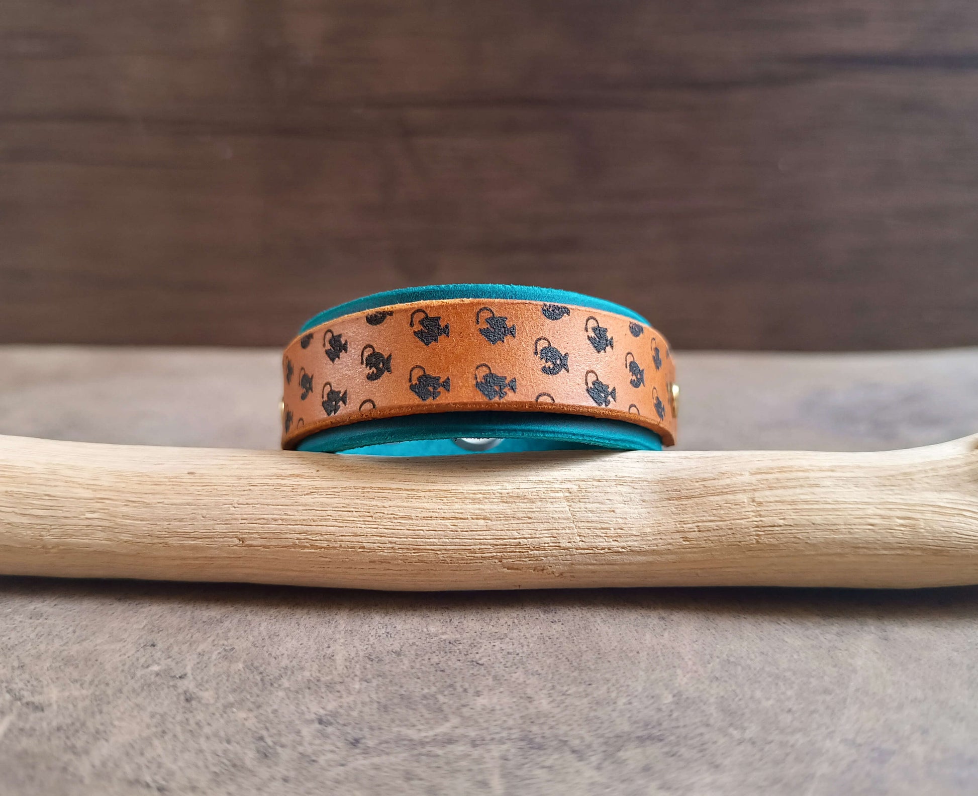 anglerfish leather bracelet on driftwood