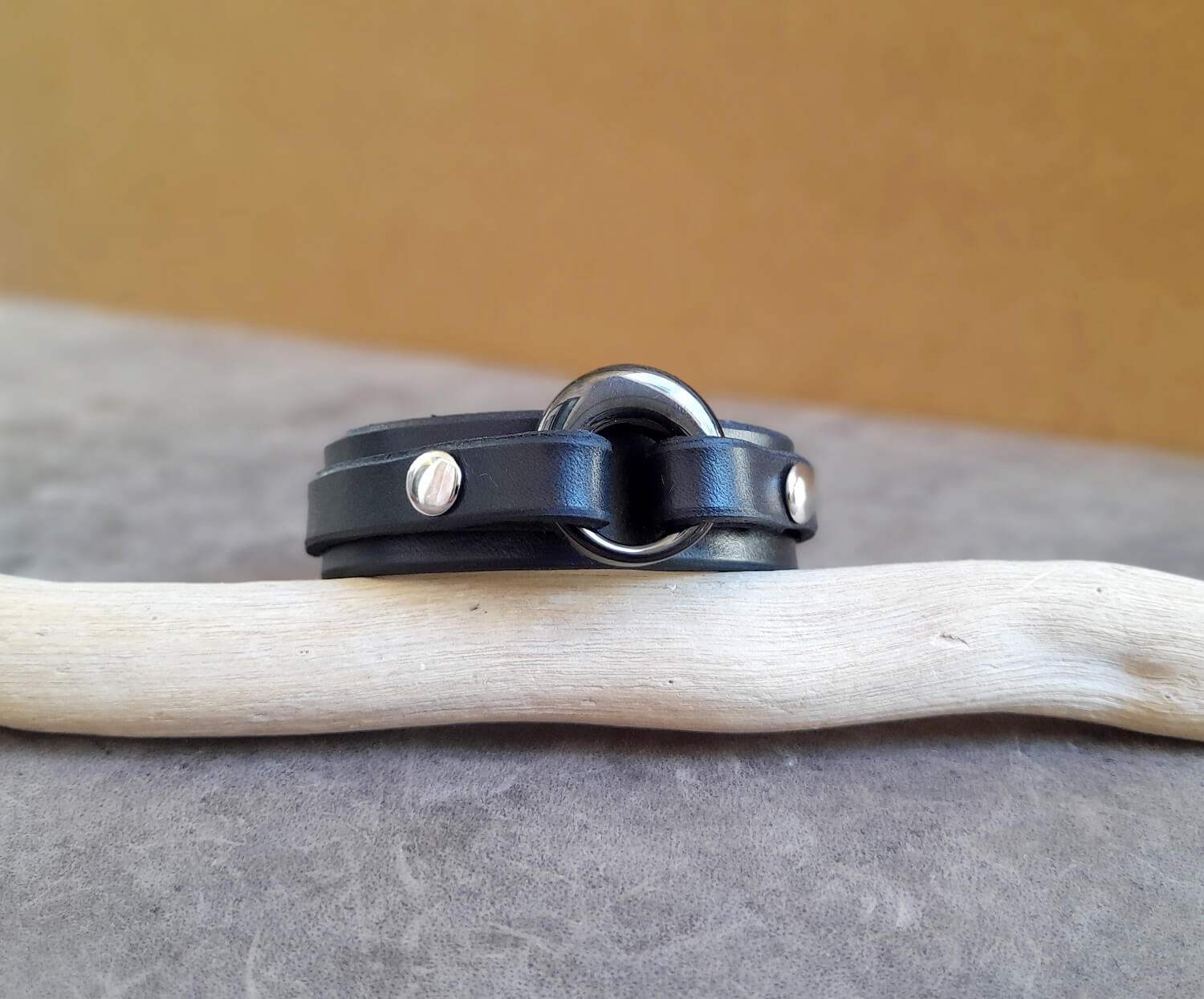 Another variation of the black leather cuff bracelet, this time with the black stainless steel urn pendant.