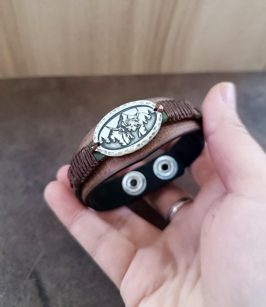 Men's layered leather cuff (Black/Brown/Khaki) with a wide fit, held on my hand. Shows the Buffalo Totem as a masculine, artistic Western accessory.