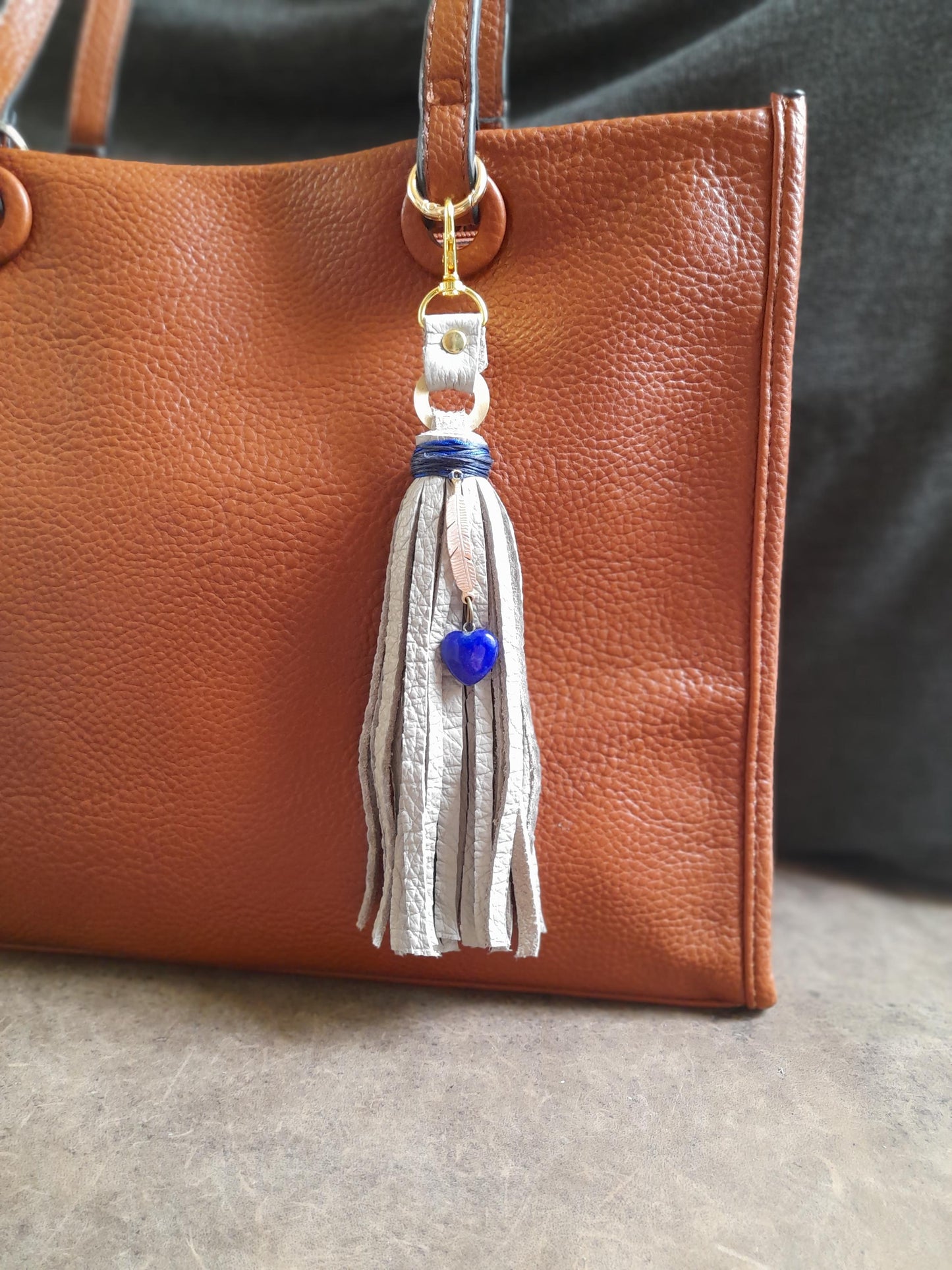 Gray Leather Tassel Bag Charm with Gold Feather and Lapis Lazuli Heart Pendant