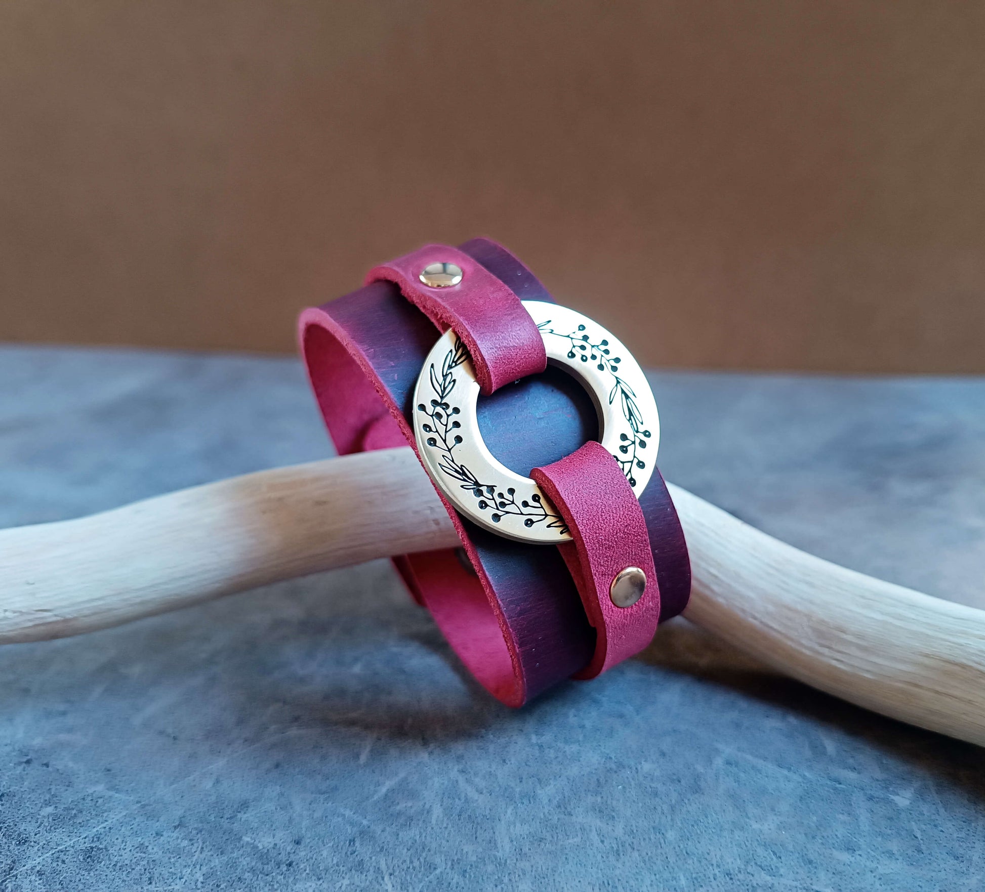 red leather cuff with engraved laurel wreath on brass gold O ring