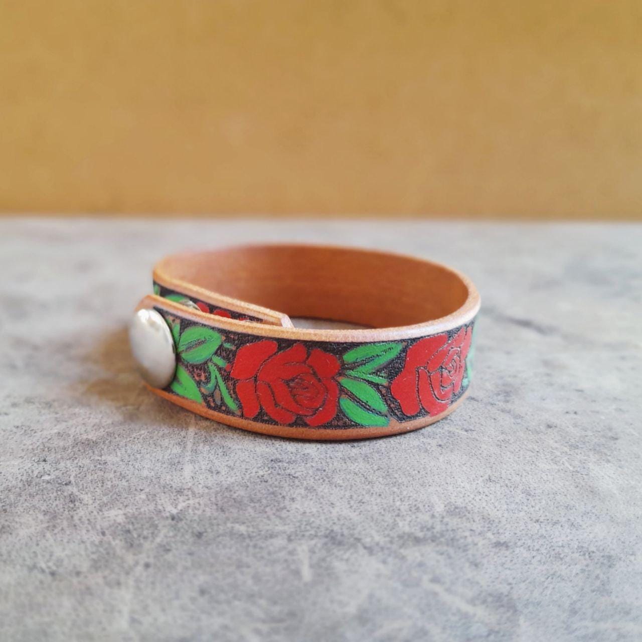red rose vine leather cuff, close up side and back wiew with snap closure