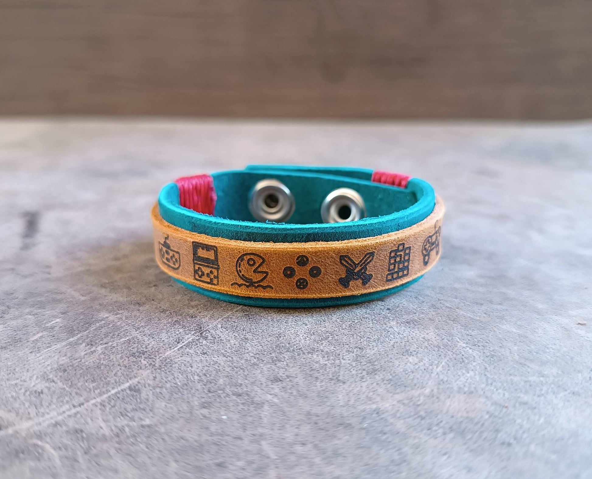 retro gaming icons blue leather cuff