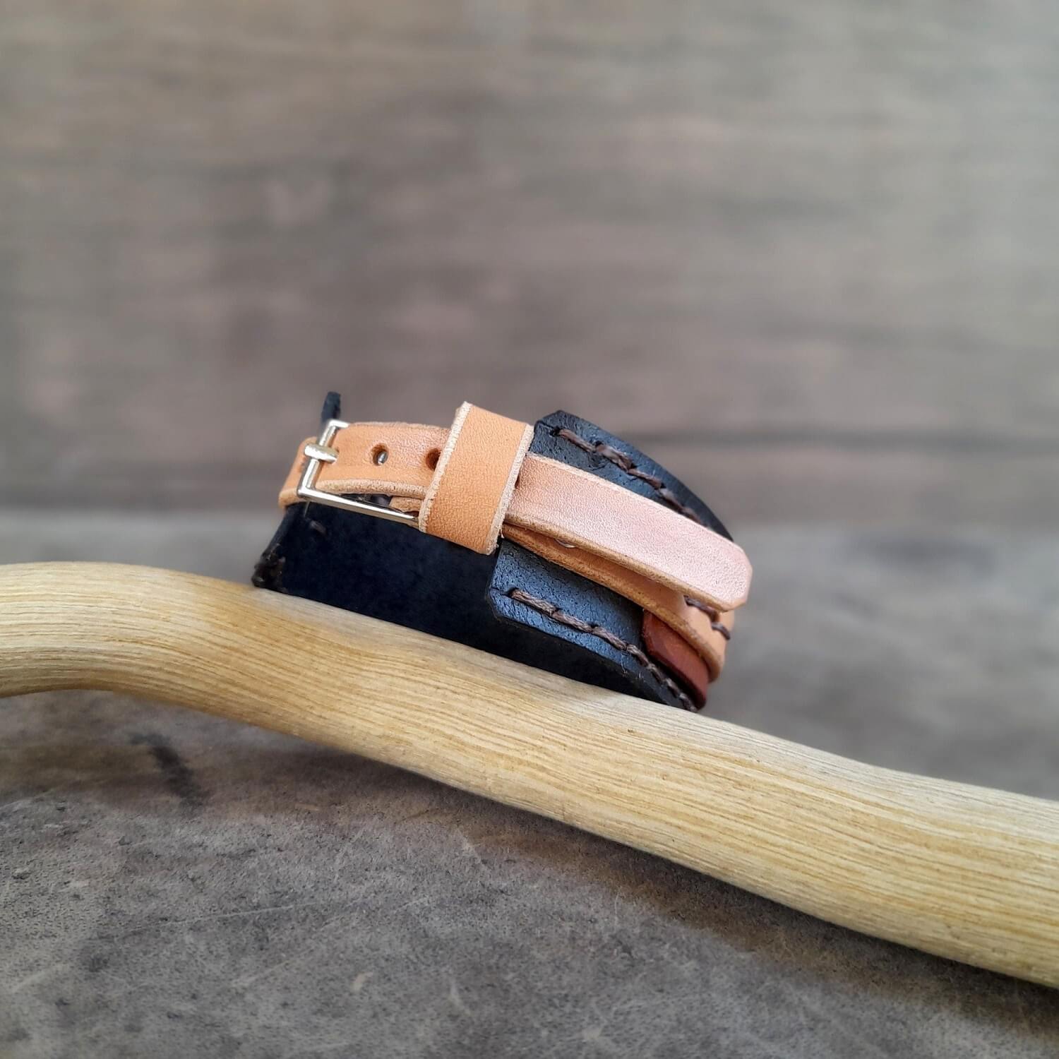 back view of the fox cuff, showcasing buckle closure and several openings for adjusting