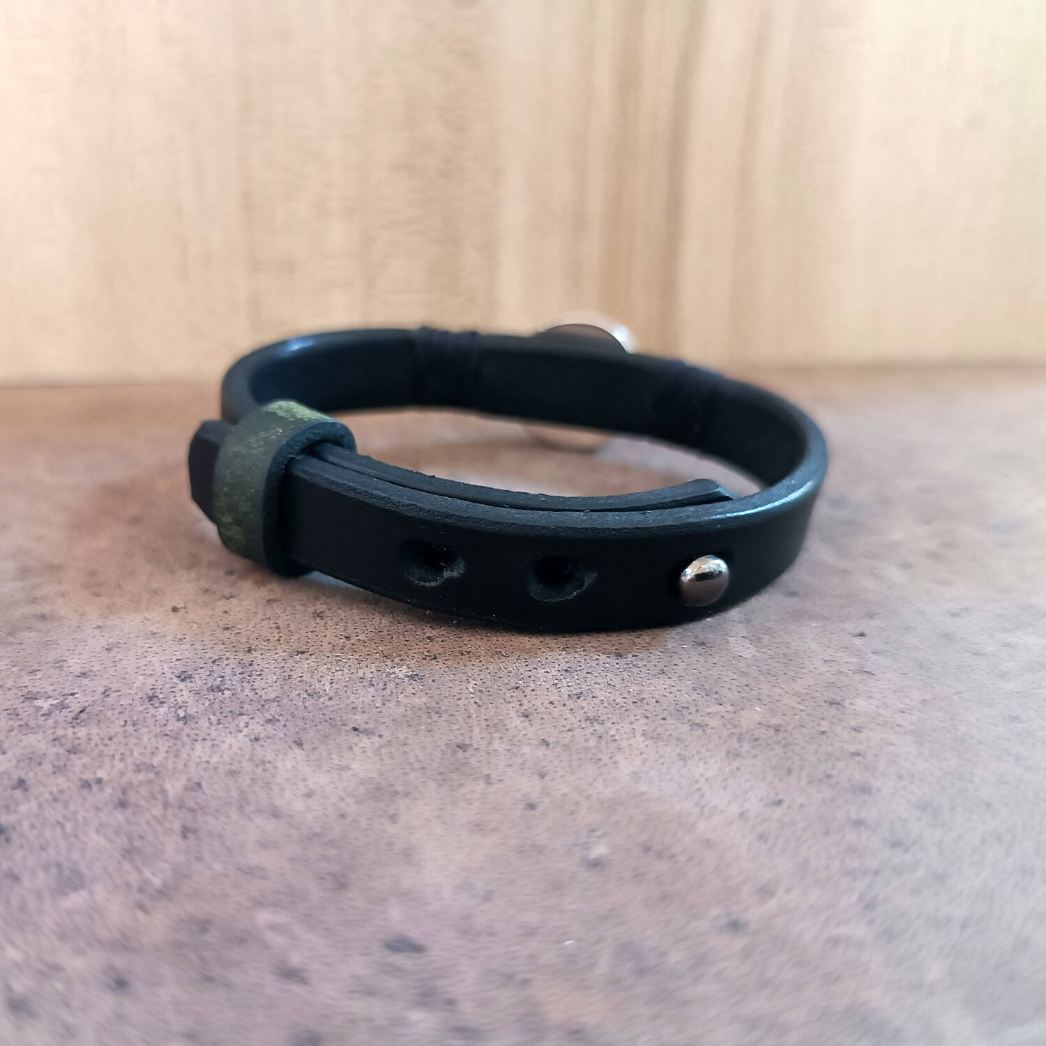 Black leather bracelet with sterling silver Tiger's Eye pendant backside view