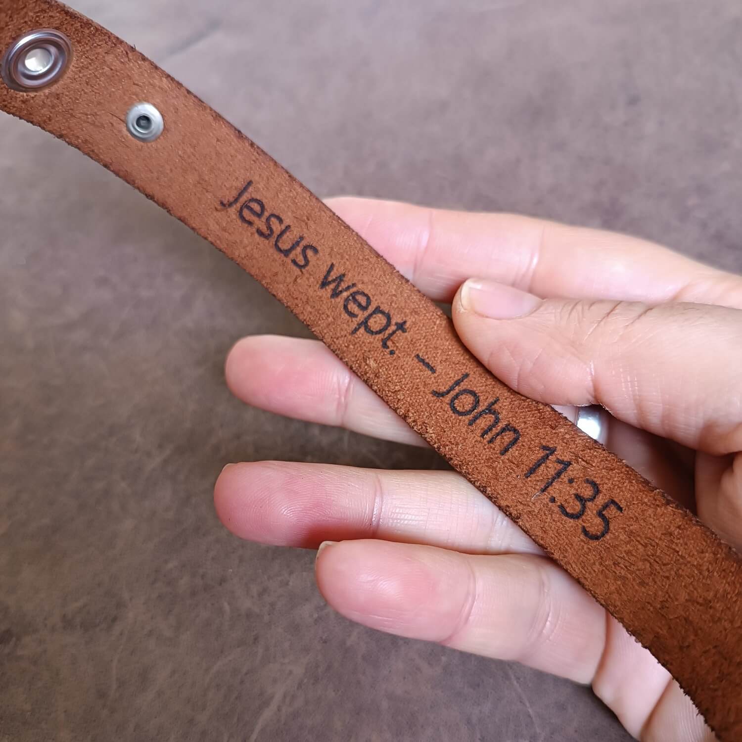 Underside full view of Layered brown leather cuff