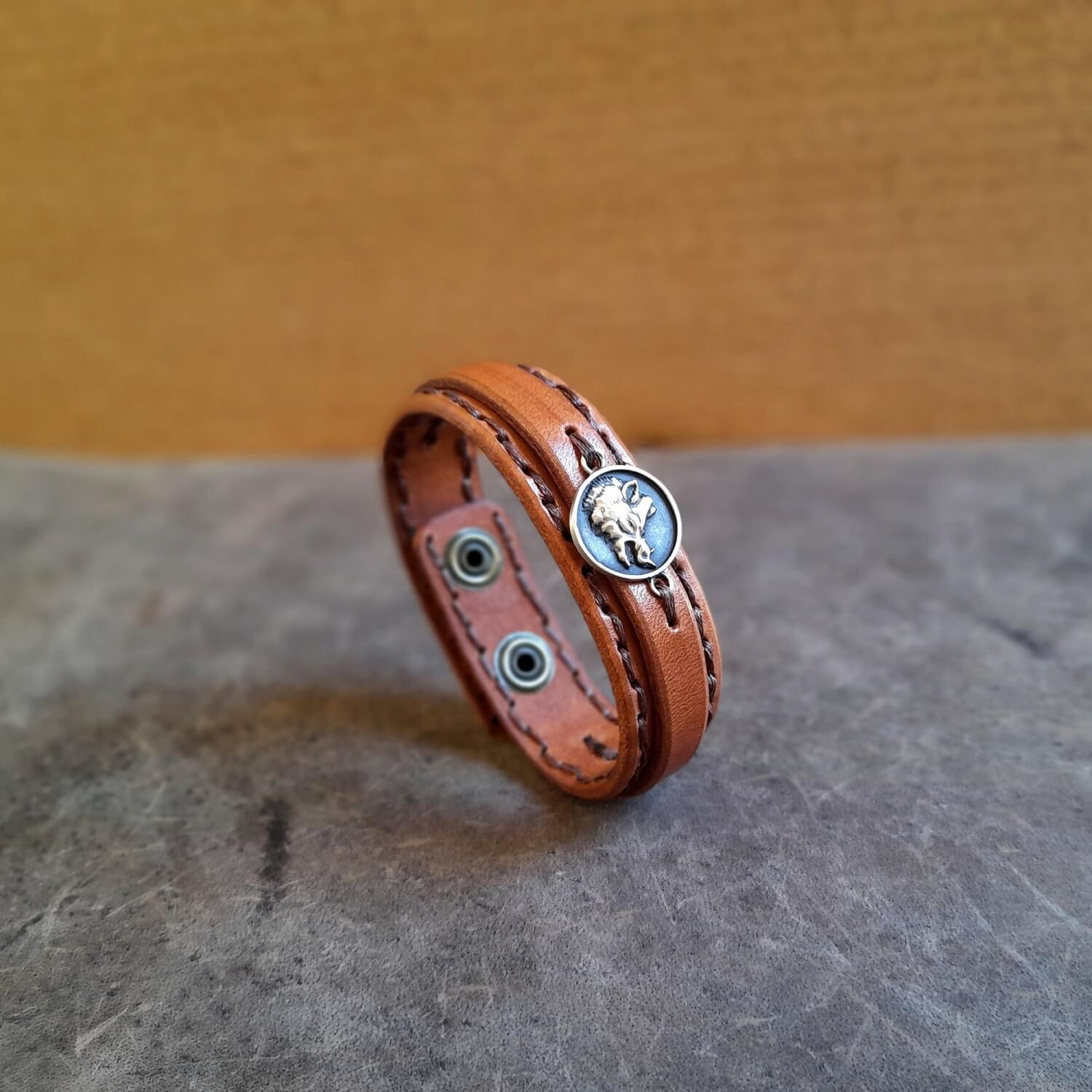 close up of full grain leather layers with rugged texture inspired by Greek mythology