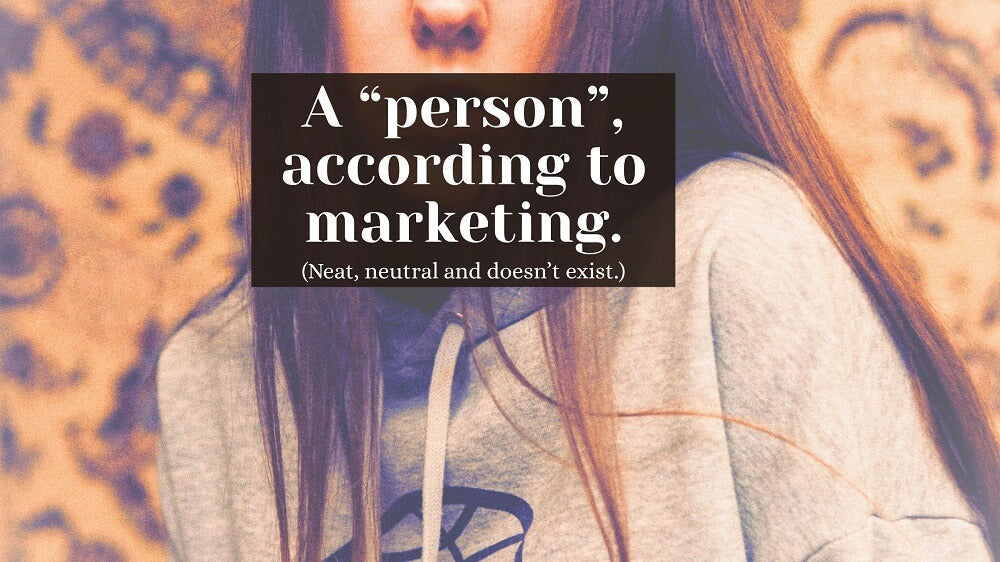 blurred, generic stock image of a woman in gray hoodie