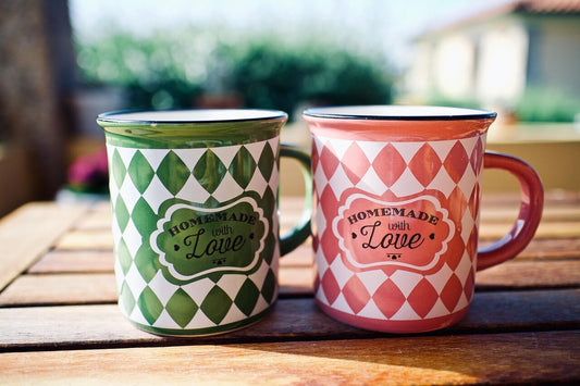 two handmade ceramic mugs